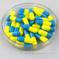 Size 00 light blue and yellow capsule shell